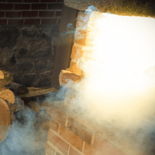 Smoking Chimney - Smoke should go up and out, not down and in your living room!